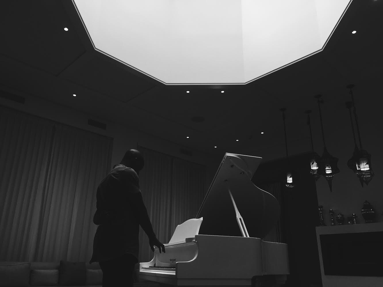 At the piano